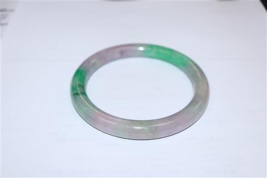 A Chinese jade bangle and two small jade carvings